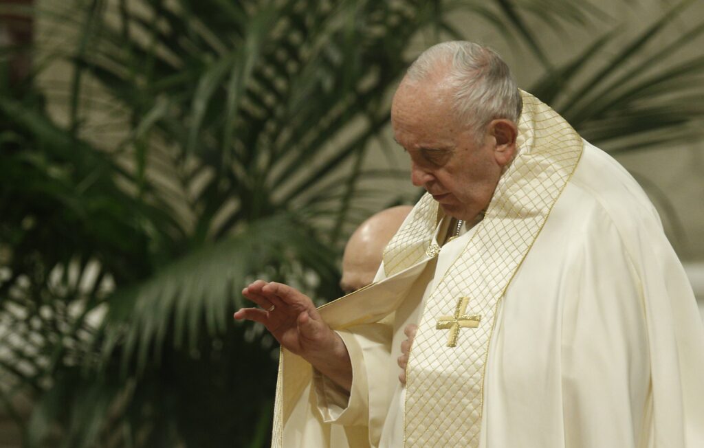 Pope Francis prays as he presides at Mass marking the feast of Our Lady of Guadalupe in St. Peter's Basilica at the Vatican.