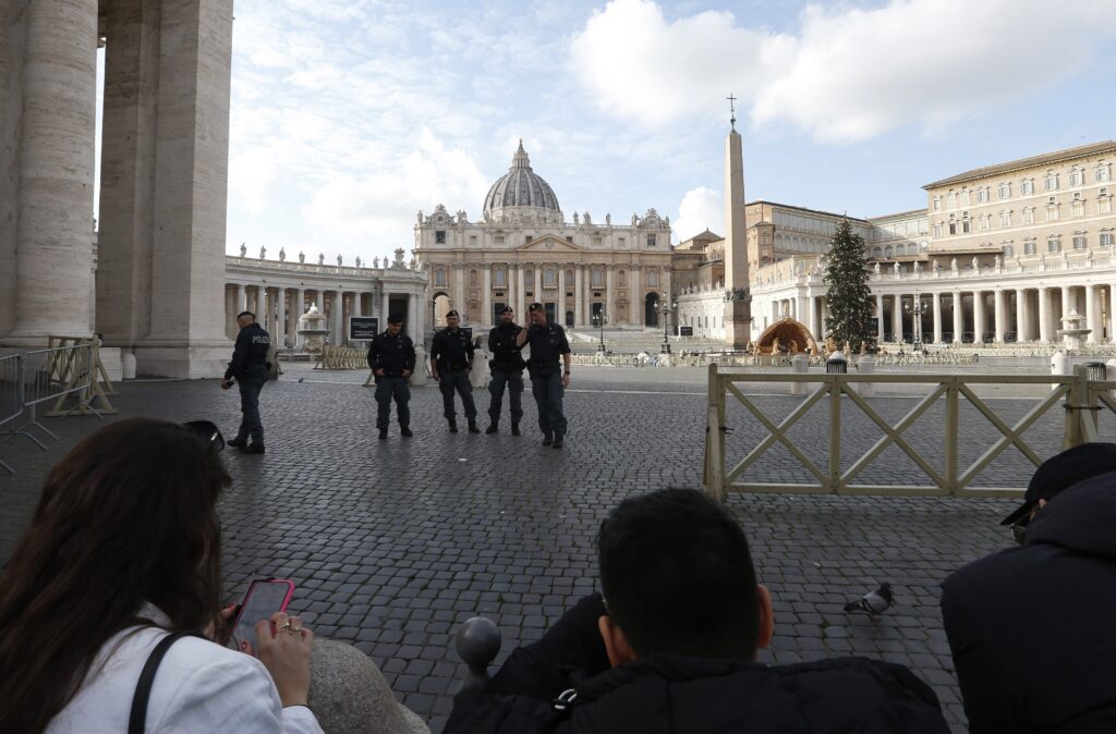 Italian police offers keep watch in St. Peter's Square after the death of Pope Benedict XVI at the Vatican Dec. 31, 2022.