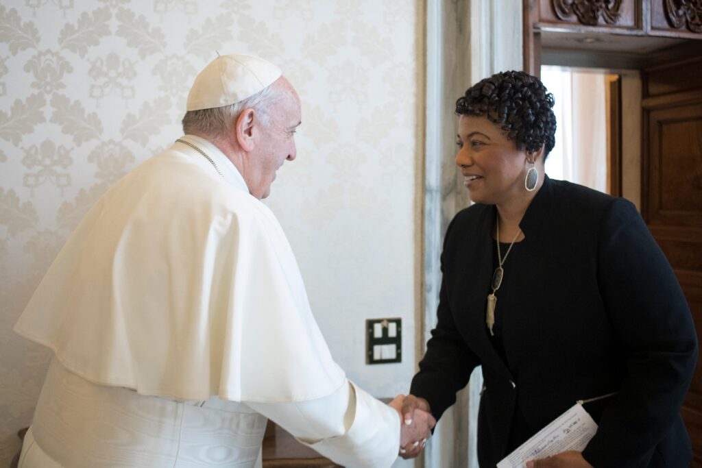 Pope Francis shakes hands with Bernice King, daughter of civil rights leader Martin Luther King Jr., during a private audience at the Vatican March 12, 2018.