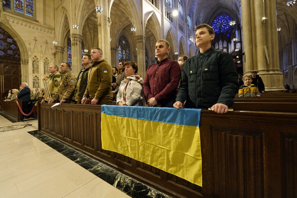 A Ukrainian flag is displayed during an ecumenical prayer service for peace in Ukraine at St. Patrick's Cathedral in New York City on Feb. 18, 2023.