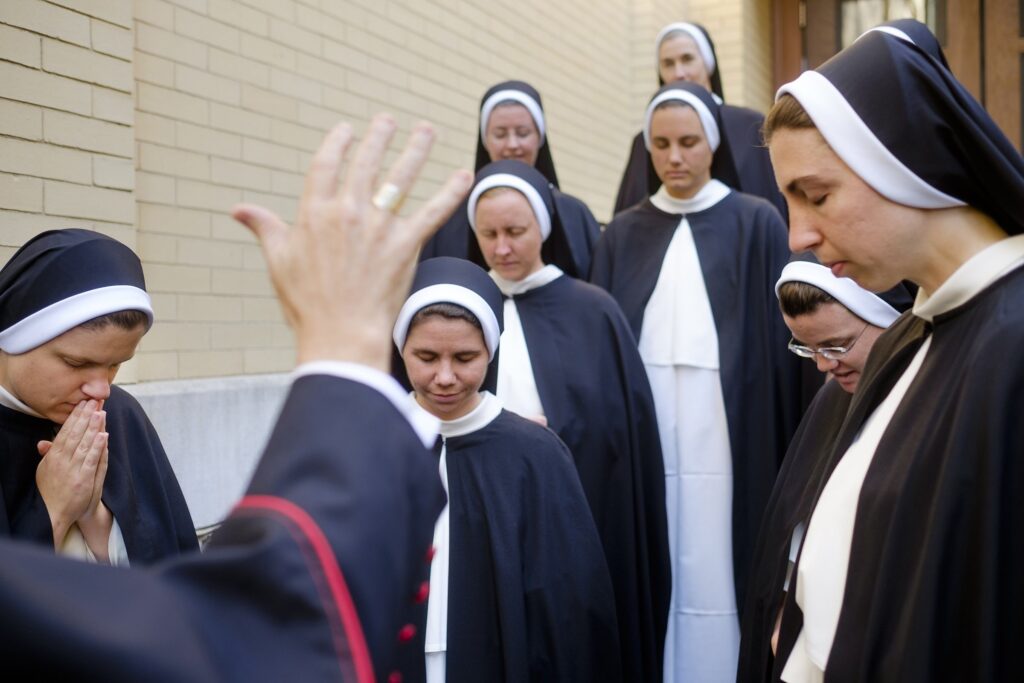 Bishop J. Mark Spalding of Nashville, Tenn., blesses eight members of the Dominican Sisters of St. Cecilia during their perpetual profession ceremony at the Cathedral of the Incarnation in Nashville July 25, 2019.