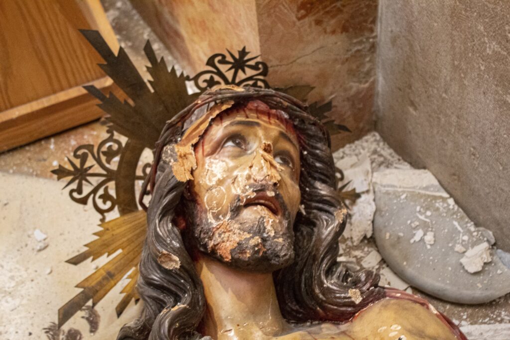 The damaged face of a statue of Christ is seen on the ground at the Church of the Flagellation in Jerusalem in this February 2023 file photo.
