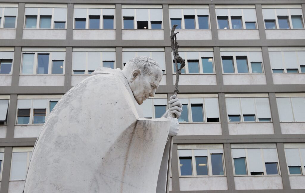 A statue of St. John Paul II is seen in the courtyard of Rome's Gemelli Hospital March 30, 2023, where Pope Francis was admitted March 29 due to concerns over breathing difficulties.