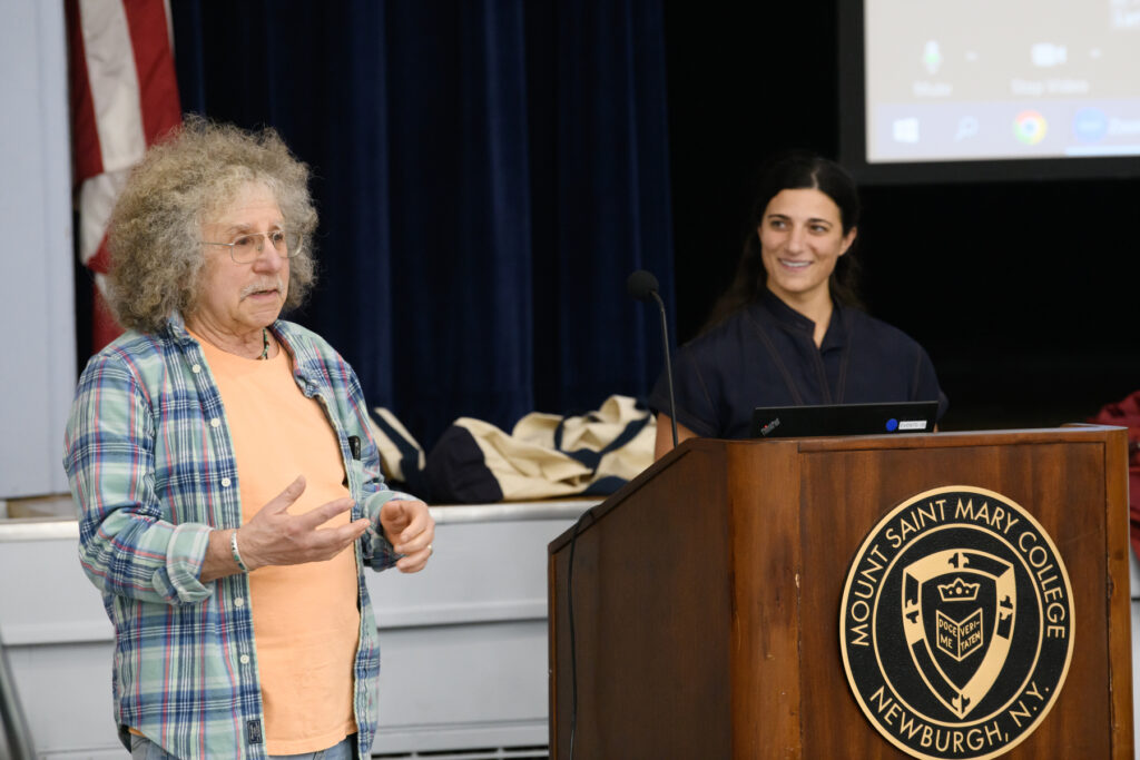 Mount Saint Mary College Psychology Professor Paul Schwartz (right) introduces keynote speaker Alana Bencivengo, PT, DPT, a pediatric physical therapist.