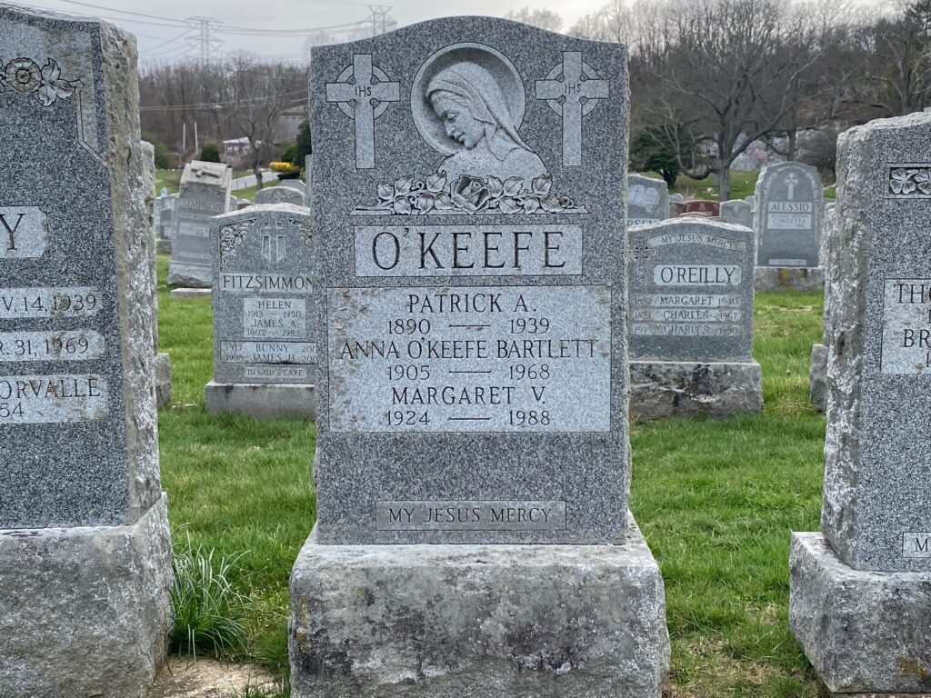 The grave of Patrick O'Keefe, one of 10 known Titanic survivors buried in cemeteries managed by the Archdiocese of New York through Calvary and Allied Cemeteries.