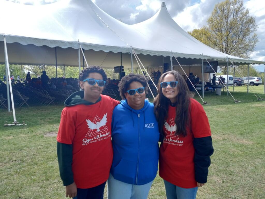 Juliemarie Hernandez (center), youth minister at St. Anthony of Padua parish in the Bronx, is in between rally fellow parishioners Janeudy Cruz and Lara Rivas on Sunday, April 23, 2023, during the 2023 New York Catholic Youth Day Middle School Youth Rally.