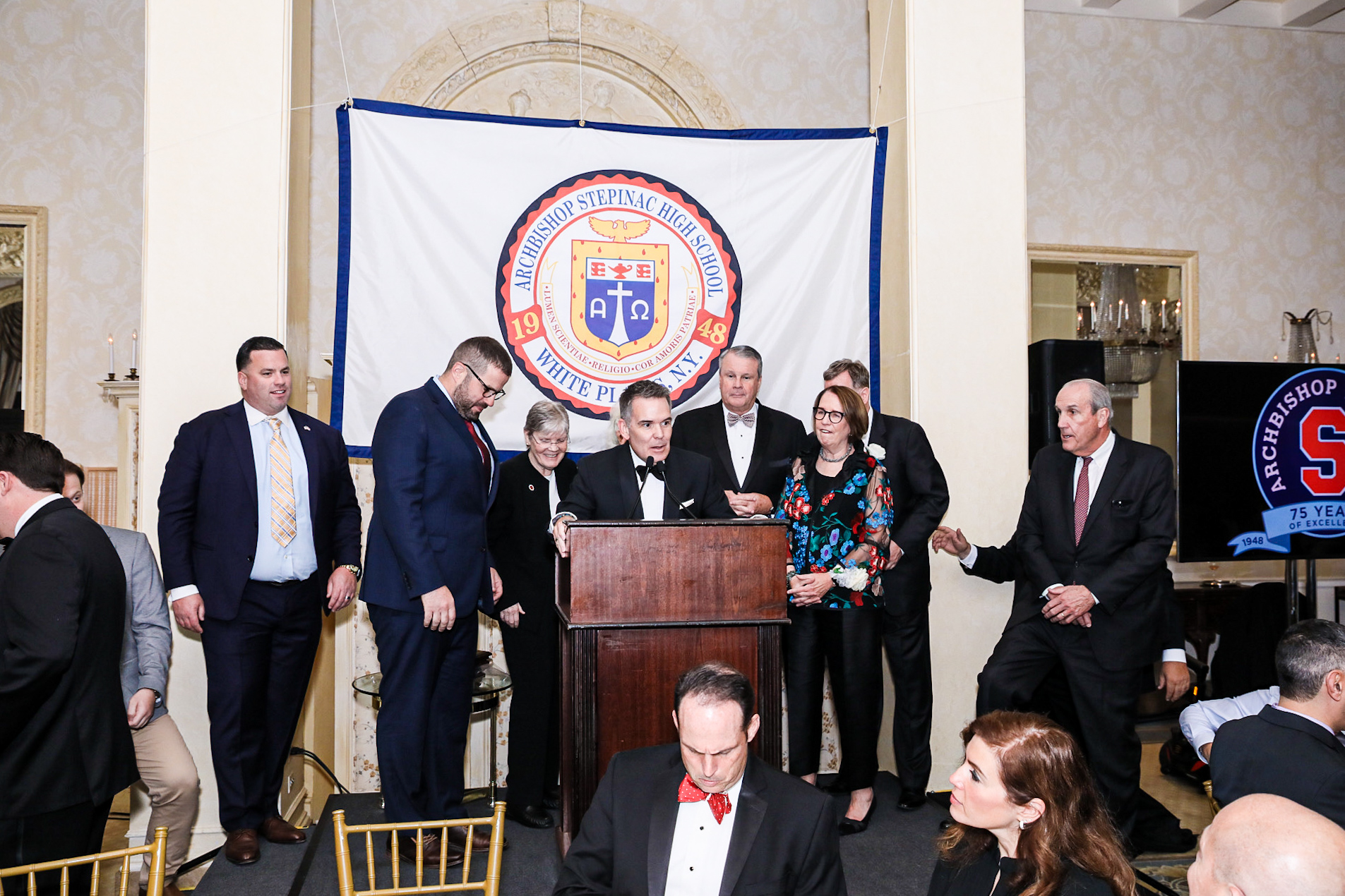 TJ McCormack (center, at podium), Director of Communications
Catholic Schools in the Archdiocese of New York, Stepinac '86, served as master of ceremonies for Archbishop Stepinac High School's 75th-anniversary gala, held May 5, 2023.