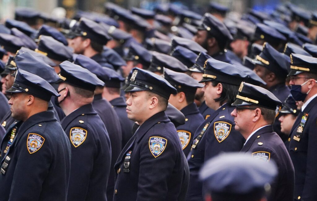 Police officers gather outside St. Patrick's Cathedral in New York City during the funeral Mass for Officer Wilbert Mora of the New York Police Department Feb. 2, 2022. Mora, 27, was fatally shot in the line of duty while responding to a domestic violence call in Harlem Jan. 21 and died of his wounds Jan. 25.