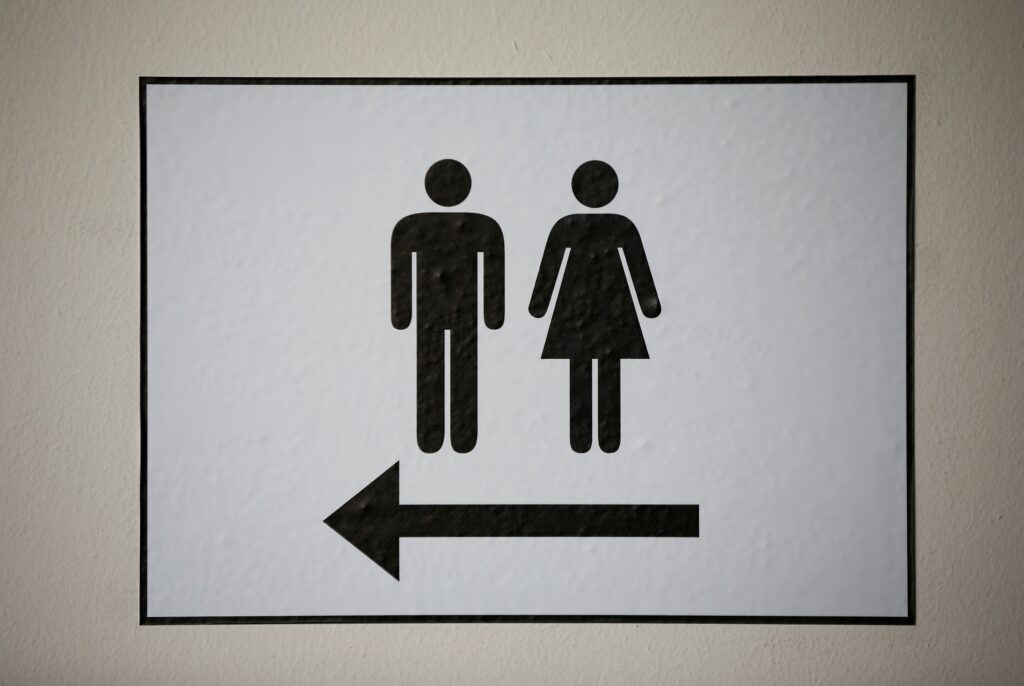 A sign illustrates men's and women's restrooms. (OSV News photo/Wolfgang Rattay, Reuters)