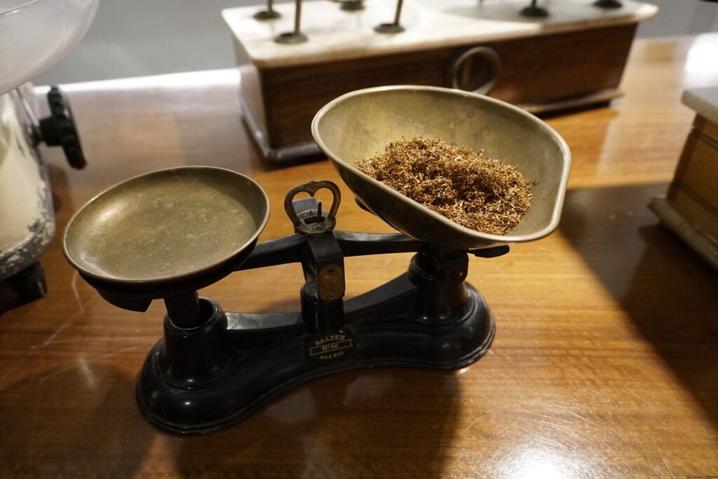An antique set of scales to weigh shredded tobacco is seen in this picture taken May 18, 2023, at the Museum of the Tobacco Shop in Rome.
