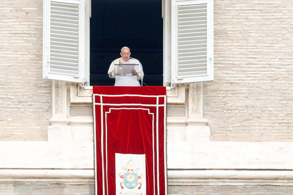 Pope Francis prays the "Regina Coeli" prayer with visitors gathered in St. Peter's Square at the Vatican May 28, 2023.