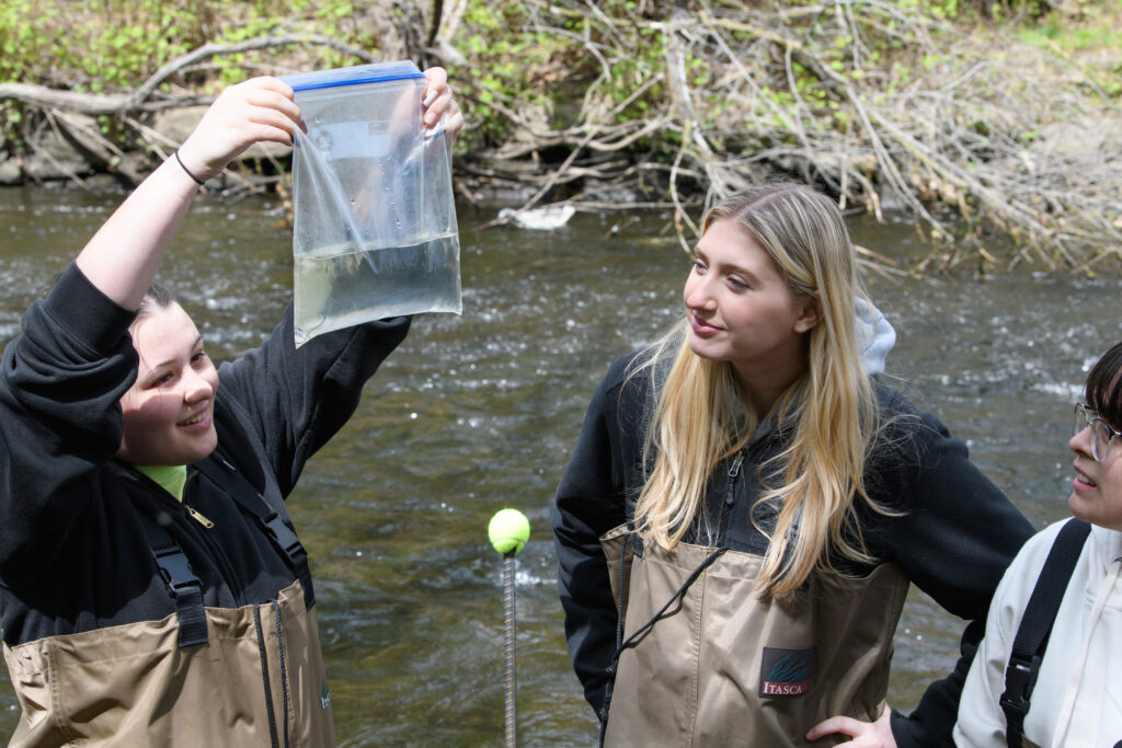 Eels count with Natural Science students in the Quassaick Creek on April 19 2023.