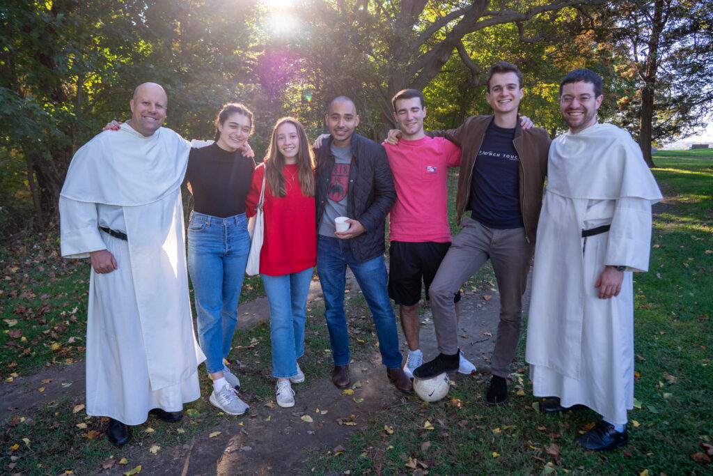 Students and coordinators from the Catholic Center at New York University pause during their 2022 fall retreat.