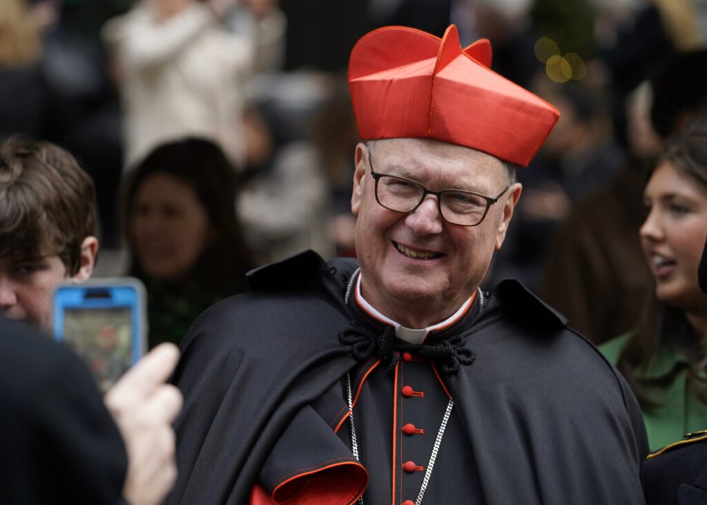 New YorArchdiocese of New York Cardinal Timothy M. Dolan smiles outside St. Patrick’s Cathedral as he reviews the St. Patrick's Day Parade in New York City March 17, 2023.