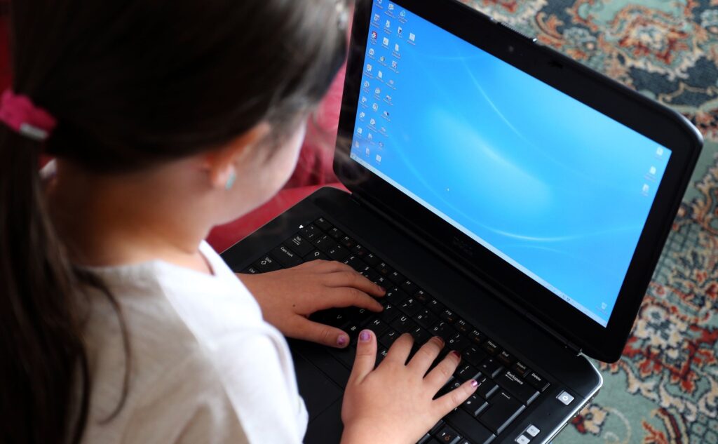 A child is shown using a laptop computer in this undated photo.