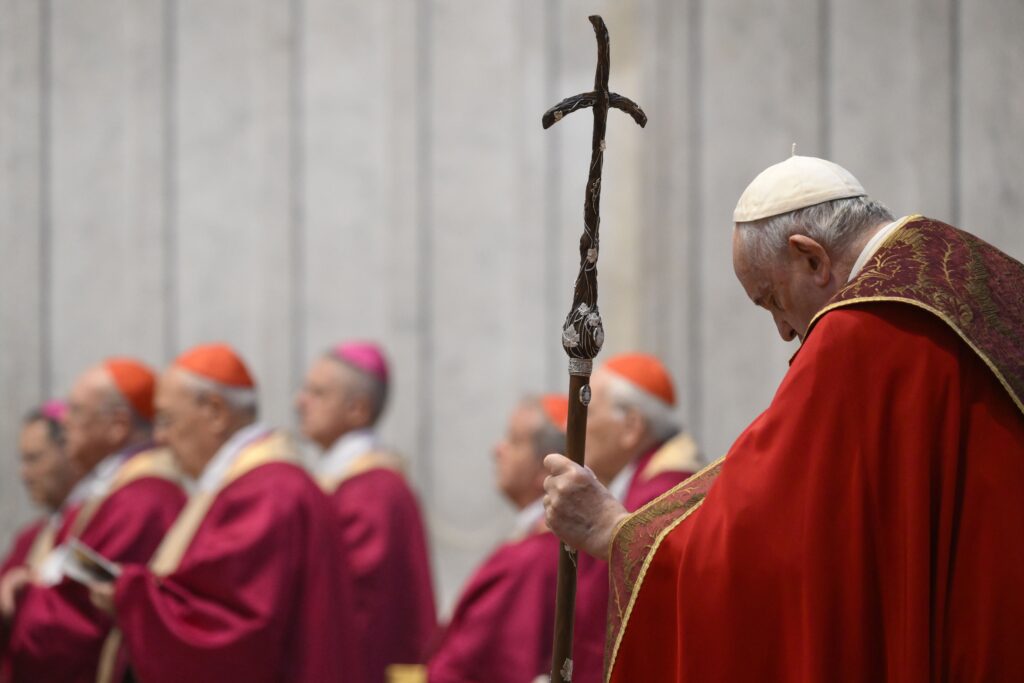 Pope Francis, cardinals and bishops pray during a Mass in St. Peter's Basilica at the Vatican in this file photo from Nov. 2, 2022.