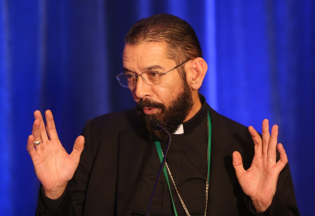 Bishop Daniel E. Flores of Brownsville, Texas, speaks June 15, 2023, during a news conference at the U.S. Conference of Catholic Bishops' spring plenary assembly in Orlando, Fla.