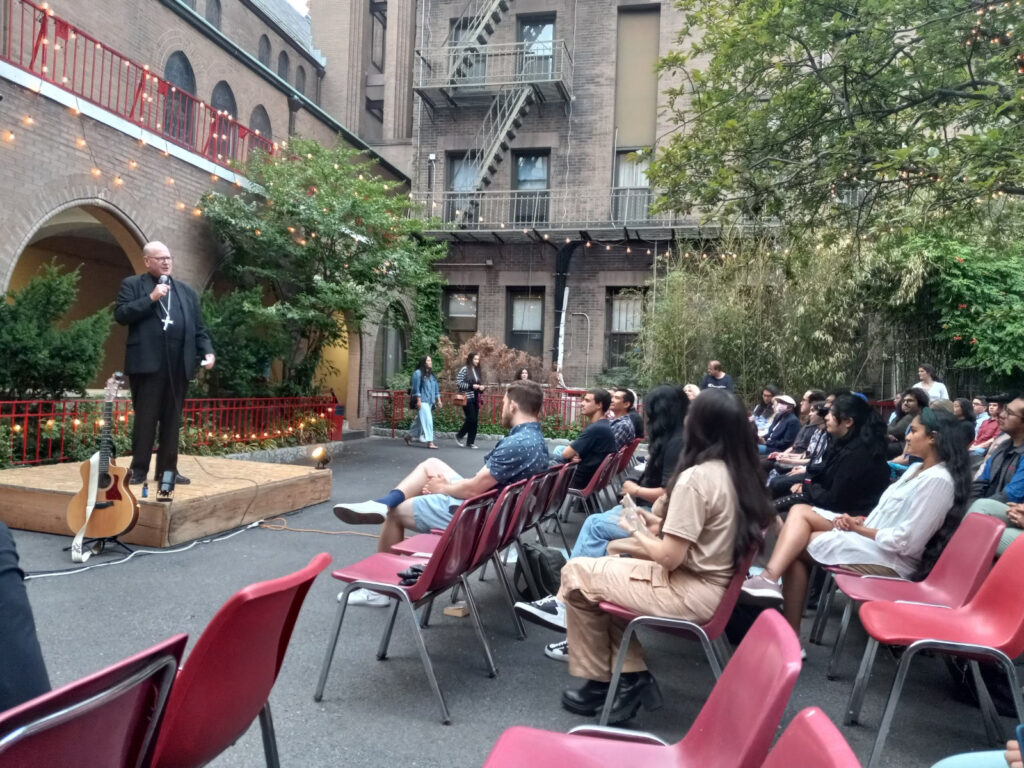 Cardinal Timothy Dolan speaks during the Love & Responsibility gathering on June 20, 2023, in the courtyard of Immaculate Conception Church on East 14th Street in Manhattan.
