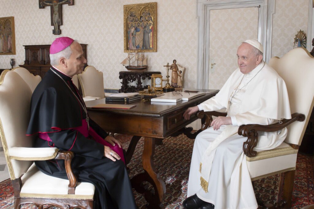 Pope Francis meets with Archbishop Robert F. Prevost, a Chicago native, during a private audience at the Vatican Feb. 12, 2022.