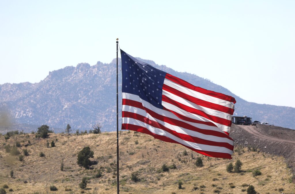A large American flag flies over Prescott, Arizona, June 29, 2023.