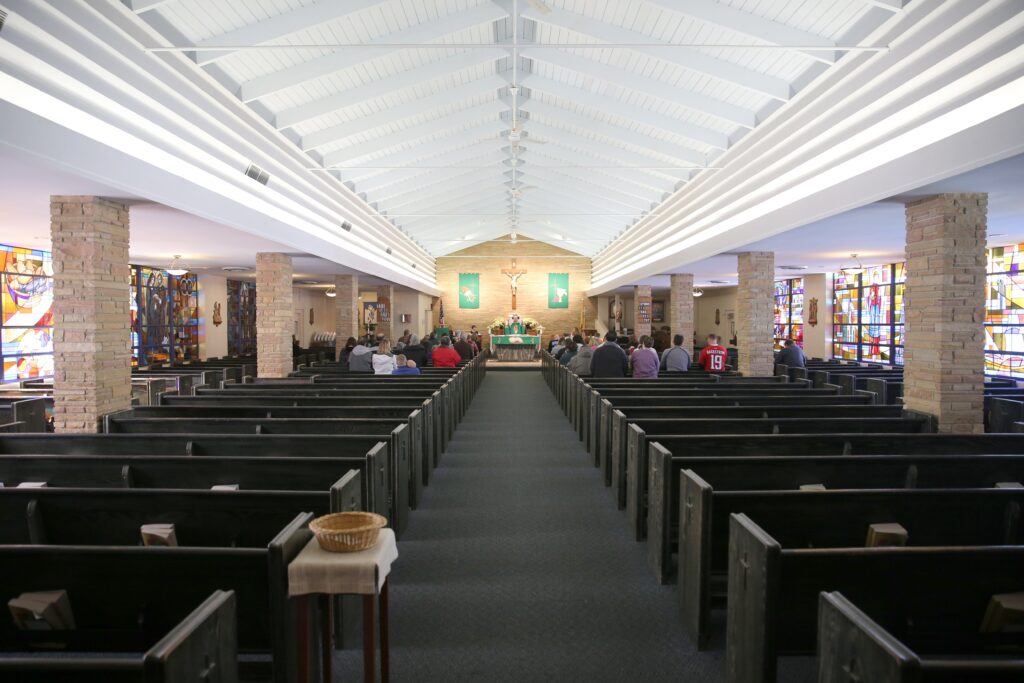 A file photo shows a sparse congregation during Mass at St. Anthony's Catholic Church in North Beach, Md.