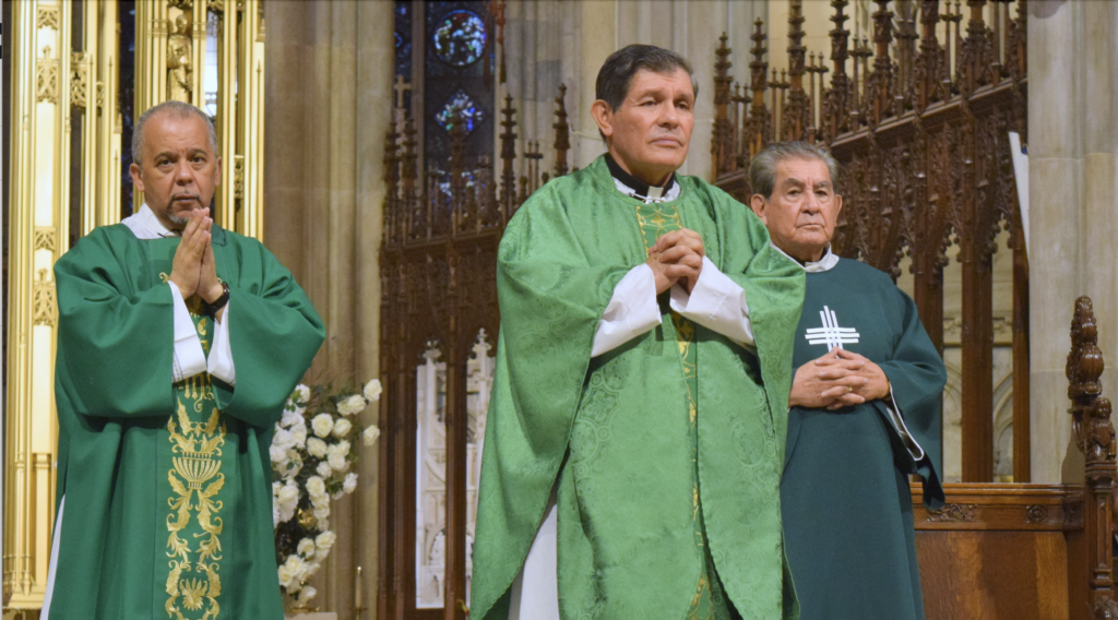 Father Lorenzo Ato, foreground, served as principal celebrant and homilist in the July 23 Mass in Honor of the Saints of Peru at St. Patrick's Cathedral.