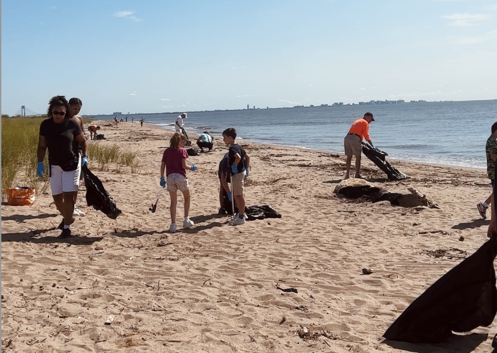 Parishioners from St. Clare Parish on the South Shore of Staten Island participate in a beach clean-up.