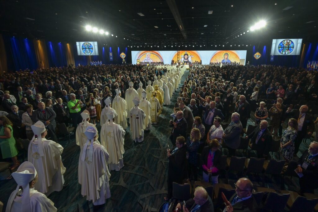 Bishops and priests process into the Cypress Ballroom at the Orlando World Center Marriott in Florida Aug. 1, 2023, for the opening Mass of the Knights of Columbus 141st Supreme Convention in Orlando.