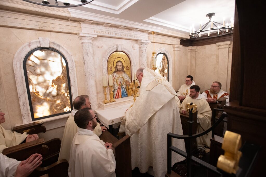 New York Cardinal Timothy M. Dolan places a monstrance holding the Eucharist on the newly dedicated altar of Manhattan's first public, perpetual adoration chapel on July 30, 2023.