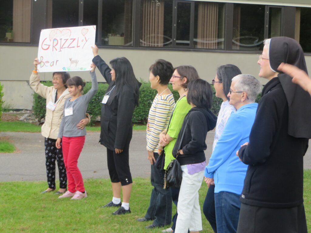 Participants in a Mariapolis retreat, hosted by the Focolare movement, engage in a fun group exercise in this undated photo from a gathering in Vancouver, British Columbia.