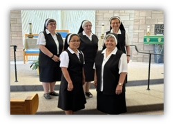 The Congregation of the Sisters of St. John the Baptist of the American Province's 2023-2027 Leadership Council. Front row: Sister Lucita Bacat, 2nd Councilor (left); Sister Joseph Paul Manderine, 4th Councilor (right). Back row: Sister Antonia Marie Zuffante, 3rd Councilor (left); Sr. Mary Cecile Swanton, Provincial Superior (center); Sister Seline Mary Flores, 1st Councilor, Vicar.