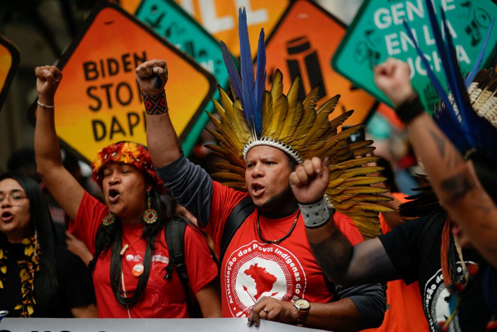 Indigenous people gesture as activists mark the start of Climate Week in New York City Sept. 17, 2023, during a demonstration calling for the U.S. government to take action toward ending fossil fuel use in order to reduce the impact of global climate change.