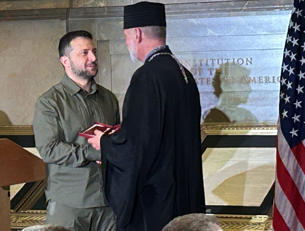 Ukraine President Volodymyr Zelenskyy presents Metropolitan Archbishop Borys Gudziak of the Ukrainian Catholic Archeparchy of Philadelphia with Ukraine's Cross of Ivan Mazepa award during a Sept. 21, 2023, ceremony at the U.S. National Archives in Washington.