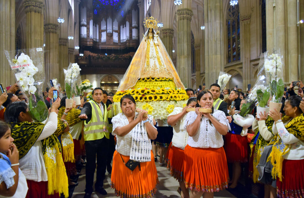 Pilgrims carry a replica of Our Lady of Cisne, patroness of Ecuador.