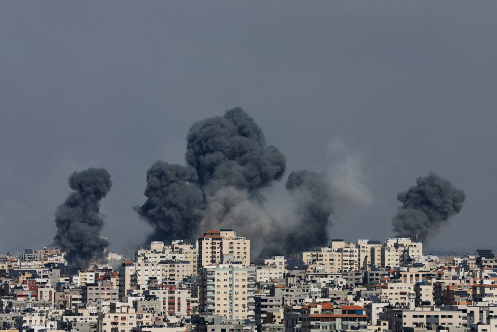 Smoke rises following Israeli strikes in Gaza, on October 7, 2023. The strikes were in retaliation after Hamas breached Israeli security along the Gaza border at dawn and entered border communities amidst a barrage of over 2,000 rockets that reached into Jerusalem and the Tel Aviv.