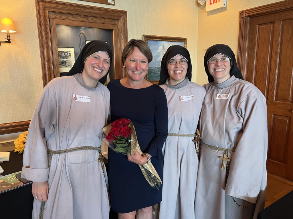 Author Jennifer Hubbard (second left) posted with Franciscan Sisters of the Renewal from Our Lady Queen of Angels Convent in Harlem, October 1, 2023.