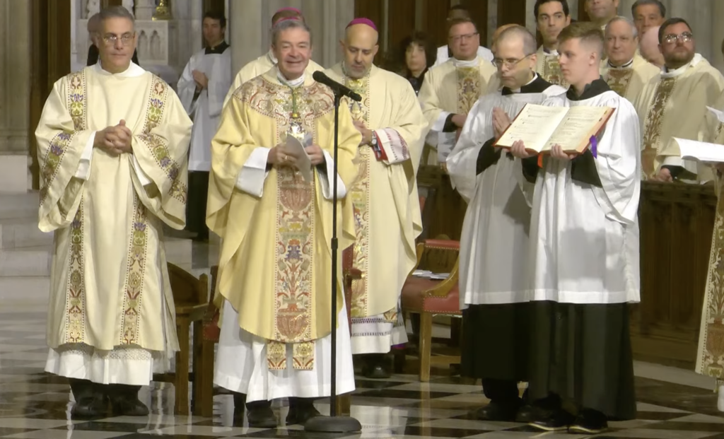 Bishop Robert Brennan, Bishop of Brooklyn, greets parishioners and guests at the annual Columbus Day Mass at St. Patrick's Cathedral, October 9, 2023.