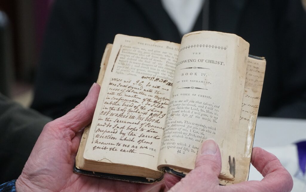 This is an original copy of St. Elizabeth Ann Seton's "The Following of Christ" (commonly translated as "The Imitation of Christ”). The book testifies to her love of Jesus. The Sisters of Charity of Seton Hill in Pennsylvania agreed to loan it to the National Shrine of St. Elizabeth Ann Seton in Emmitsburg, Maryland, for display in the shrine's new $4 million museum and visitors center, which opened September 22, 2023.