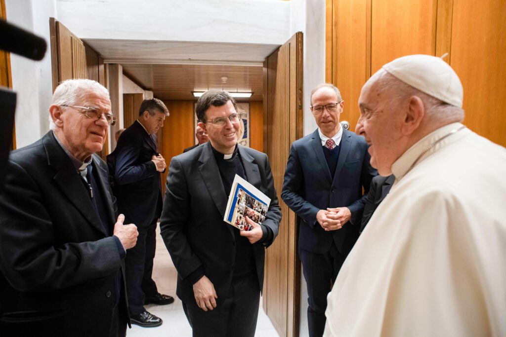 Pope Francis meets with Jesuit Father Federico Lombari, president of the Joseph Ratzinger-Benedict XVI Vatican Foundation (left) and with the winners of the 2023 Ratzinger Prize: Father Pablo Blanco Sarto (center) and Francesc Torralba, a philosopher and theologian (right), at the Vatican November 30, 2023.
