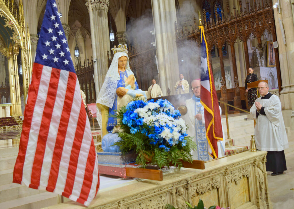 Archdiocese of New York Auxiliary Bishop Peter Byrne blesses the image of Our Lady at the annual Our Lady of Divine Providence Mass, November 19, 2023, at St. Patrick's Cathedral.