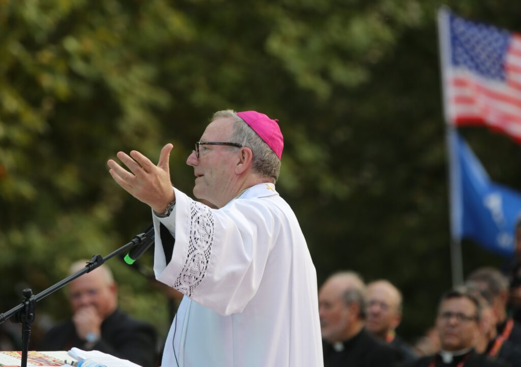 Bishop Robert Barron of Winona-Rochester, founder of Word on Fire Catholic Ministries, speaks at a National Gathering for U.S. pilgrims, at Quintas das Conchas e dos Lilases Park in Lisbon, Portugal, August 2, 2023, during World Youth Day.