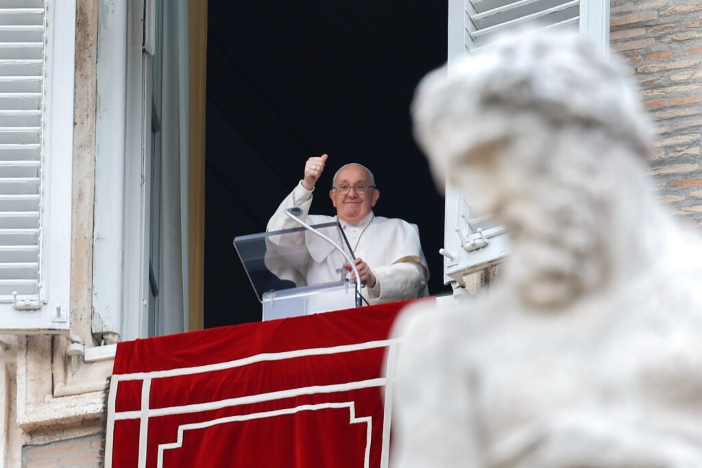 Pope Francis gives a thumbs up to a group of young people who joined him for the recitation of the Angelus prayer on the feast of St. Stephen, the first Christian martyr, in St. Peter's Square at the Vatican on December 26, 2023.