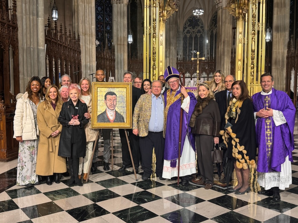 Cardinal Timothy Dolan with the artist, Hunt Slonem, and the Pierre Toussaint portrait in a group photo after the Sunday, December 3 Mass at St. Patrick's Cathedral. Fr. Enrique Salvo, cathedral rector, is at far right.