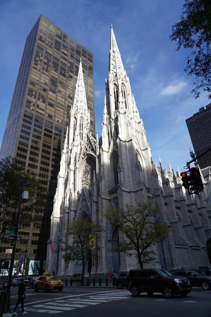 The spires of St. Patrick’s Cathedral in Manhattan are illuminated by the late afternoon sun on October 18, 2020.