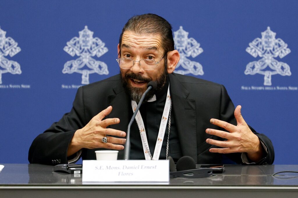 Bishop Daniel E. Flores of Brownsville, Texas, speaks during a briefing about the assembly of the Synod of Bishops at the Vatican on October 19, 2023.