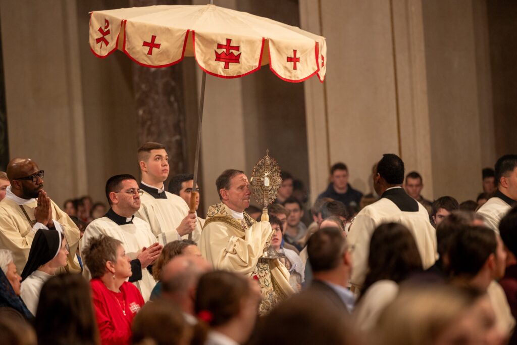 Bishop Michael F. Burbidge of Arlington, Virginia., chairman of the U.S. Catholic bishops' Committee on Pro-Life Activities, carries the monstrance during the opening Mass of the National Prayer Vigil for Life January 18, 2024, at the Basilica of the National Shrine of the Immaculate Conception in Washington.