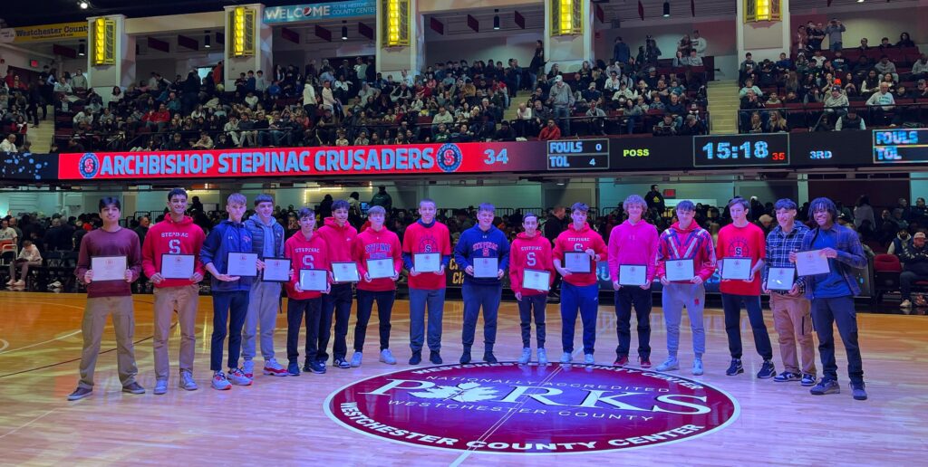 Proudly displaying their certificates of commendation before the fans among others were (l-r): Waiz Aamir (Yonkers), Nathaniel Alvarez (Ossining), Tom Brady (Yonkers), Shane Byrne (Yonkers), Antonio Coffaro (Yonkers), Riley Colon (Yonkers), Sean Delaney (White Plains), Tyler Dobeck (Scarsdale), Jack Doyle (Yonkers), Dylan Fox (Yonkers), Ryan Harvey (Yonkers), Paul LeBlanc (Yonkers), Conor McCormack (Yonkers), Thomas Pavletich (Mahopac), Jordan Prado (White Plains) and Vuswe Watson (White Plains).