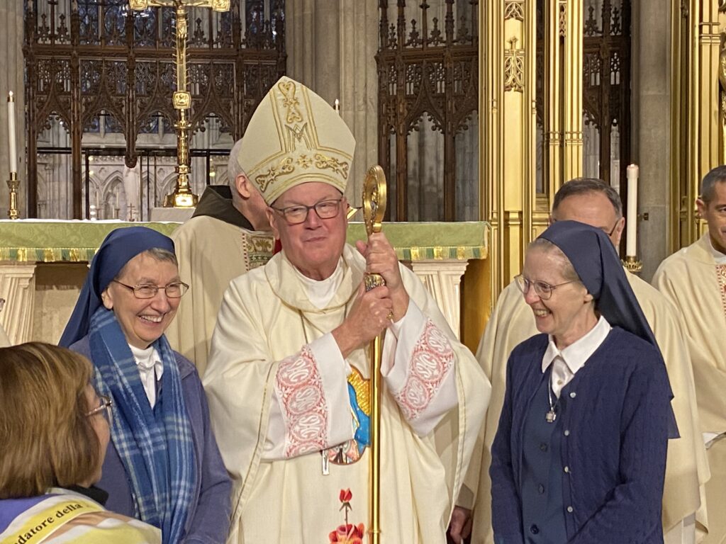 Cardinal Timothy Dolan (center) chats with Sister Donald Maria Lynch (right), Provincial Superior of the Daughters of St. Paul, and Sister Karen Marie Anderson, Provincial Councilor, following the Daughters of St. Paul's farewell Mass at St. Patrick's Cathedral, January 20, 2024.