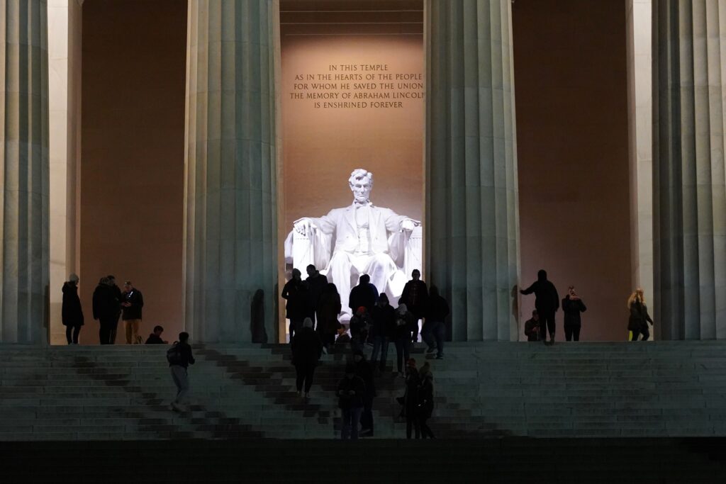 People are seen visiting the Lincoln Memorial in Washington December 15, 2019.