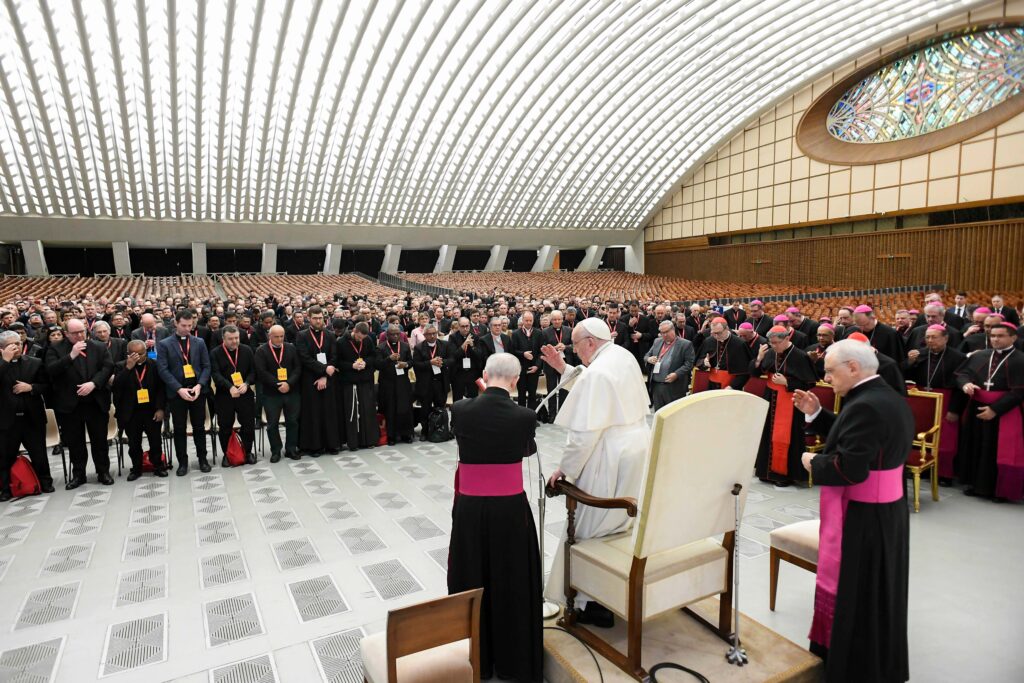 Pope Francis gives his blessing to participants in an international conference on the ongoing formation of priests sponsored by the dicasteries for Clergy, for Evangelization and for the Eastern Churches in the Paul VI Audience Hall at the Vatican February 8, 2024.